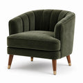 Fauteuil en velours vert avec pieds en bois