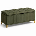 Banc de rangement en velours vert avec pieds en métal doré